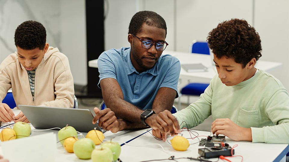 science-teacher-demonstration-in-class